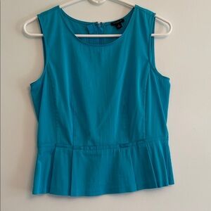 Sleeveless Blue Peplum Top